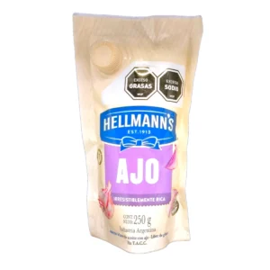 Envase doypack de Mayonesa HELLMANN´S de 250g sabor Ajo, con diseño en tonos crema y violeta, destacando sellos de advertencia nutricional y logo Sin T.A.C.C..